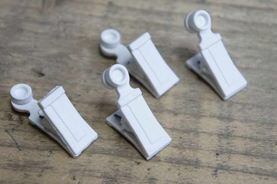 Затискач для штор з роликом білий 3003-01-50