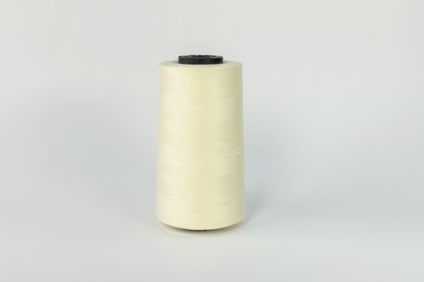 Нитки швейні №40/2 Barva штапельні поліестер 100% молочний жовтий 5000 м 1013 1013-40/2-5000