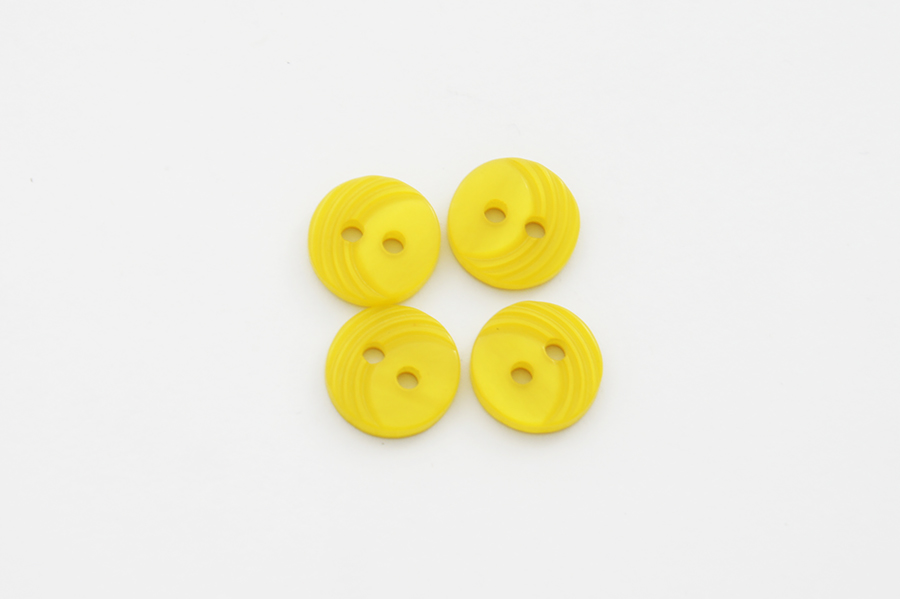 Гудзик 11 мм 2 отвори перламутр жовтий