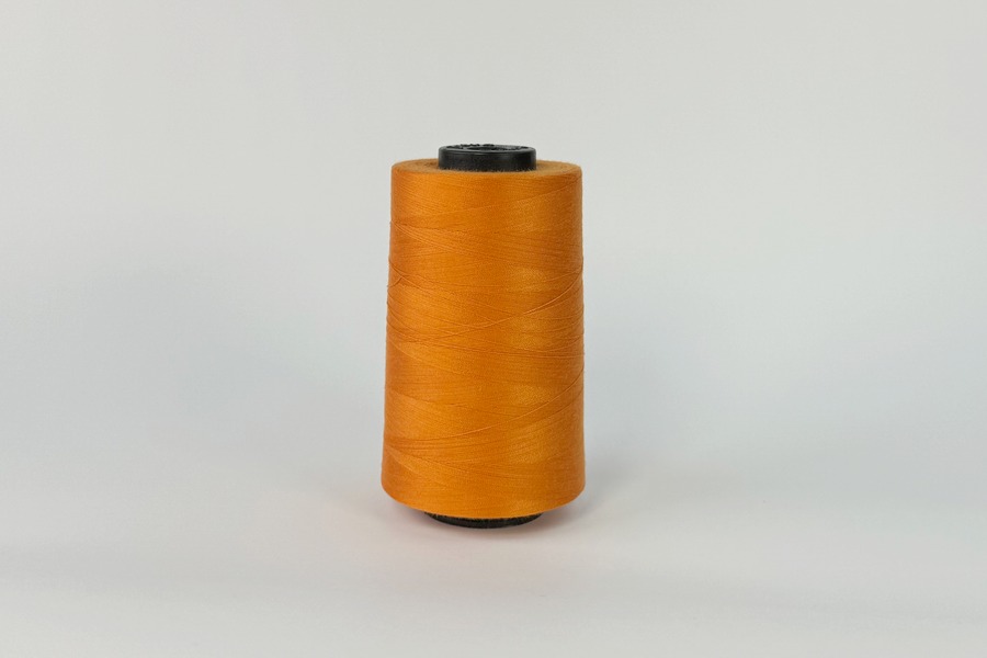 Нитки швейні №40/2 Barva штапельні поліестер 100% оранжевий рудий 5000 м 6019