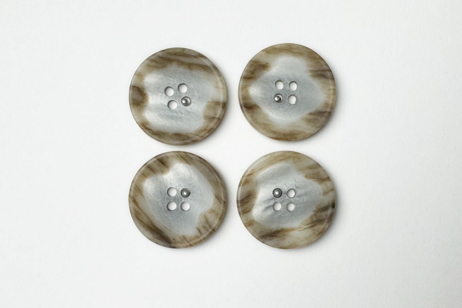 Гудзик 23 мм Mertbutton 4 отвори фактурний бежевий сірий світлий