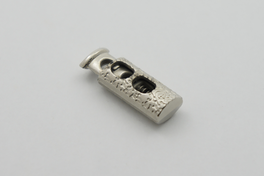 Фіксатор для шнура Mertbutton подвійний нікель 10х25 мм MTL 137-nik