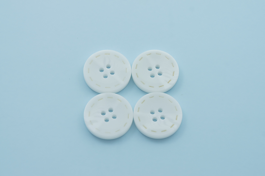 Гудзик 23 мм Mertbutton 4 отвори класичний білий