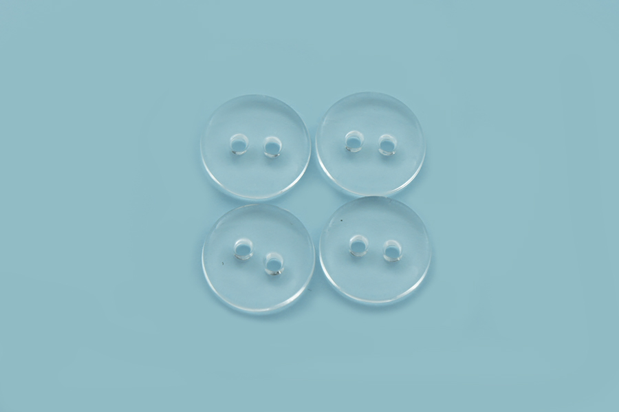 Гудзик 13 мм Mertbutton 2 отвори глянець прозорий