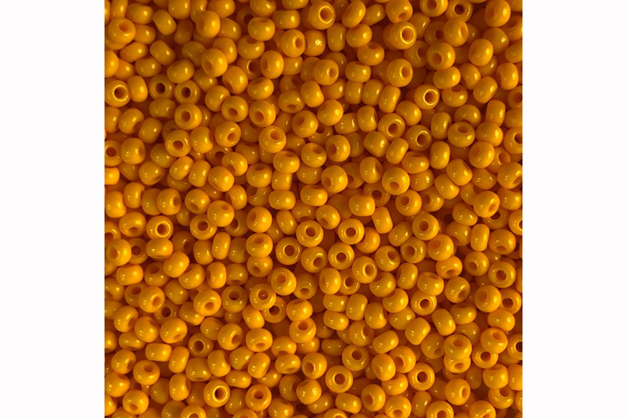 Бісер Preciosa 93110 №10 непрозорий натуральний оранжевий жовтий 2,3 мм