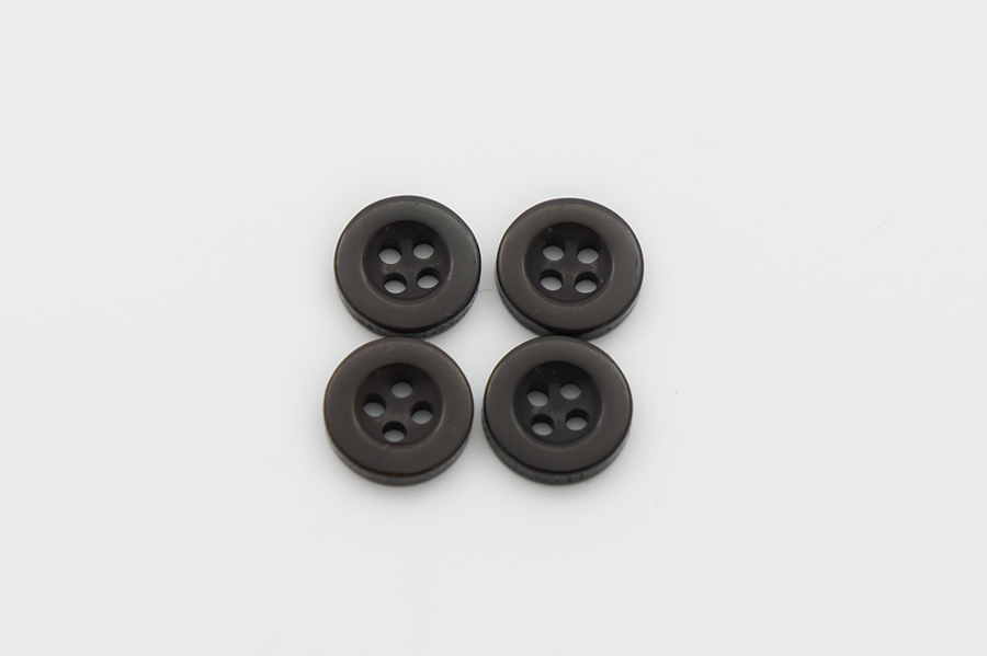 Гудзик 11 мм Mertbutton 4 отвори однотонний коричневий