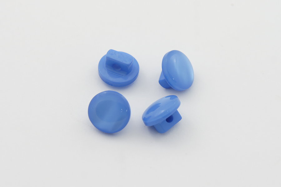 Гудзик на ніжці 10 мм Mertbutton перламутр волошковий світлий