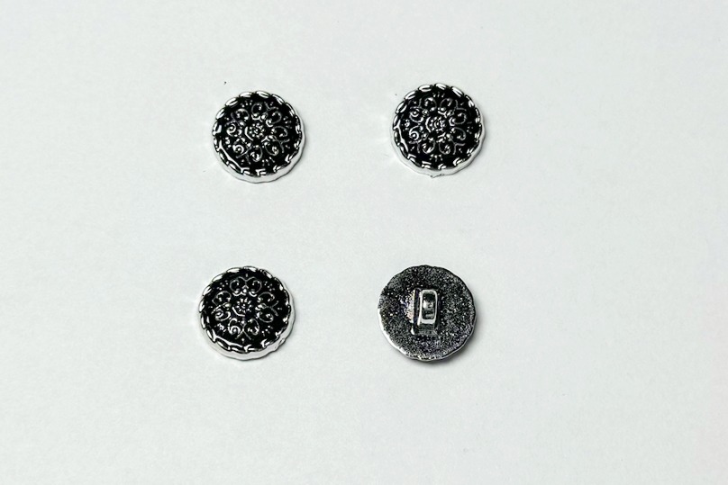 Гудзик на ніжці 15 мм Mertbutton металізований чорний BR-652-24-000/silver