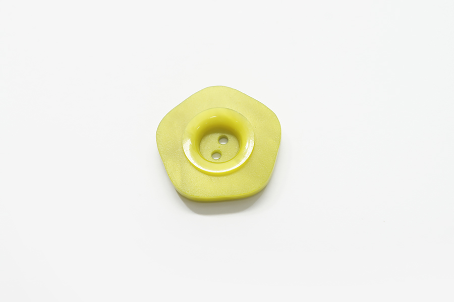 Гудзик 27 мм 2 отвори фігурний 042-2-Iсп