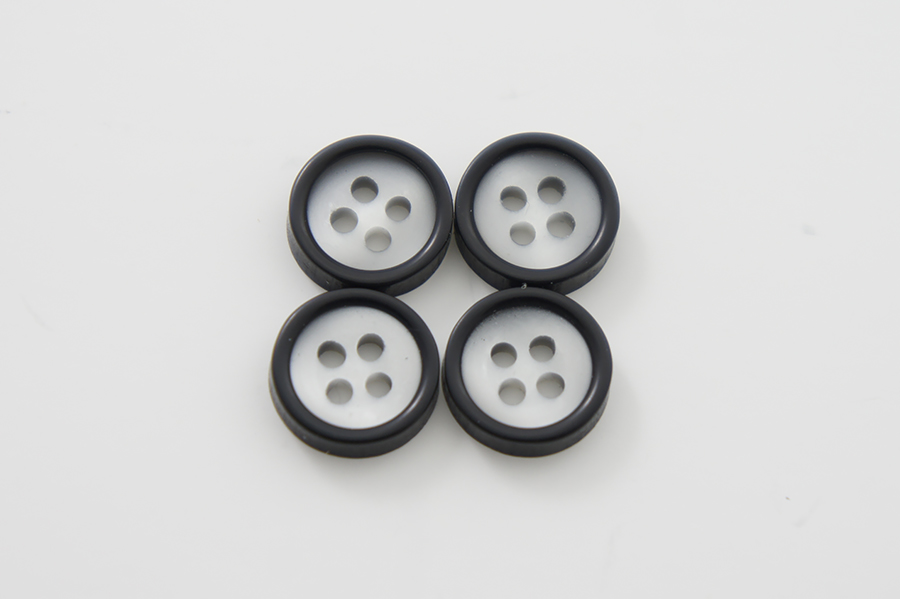 Гудзик 11 мм Mertbutton 4 отвори матовий білий