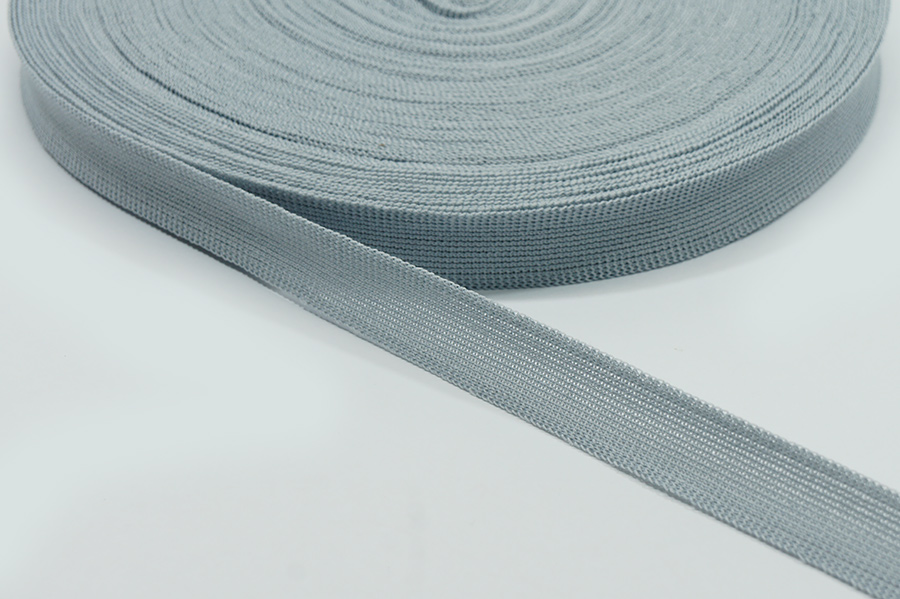 Тасьма 18 мм в'язана сірий світлий