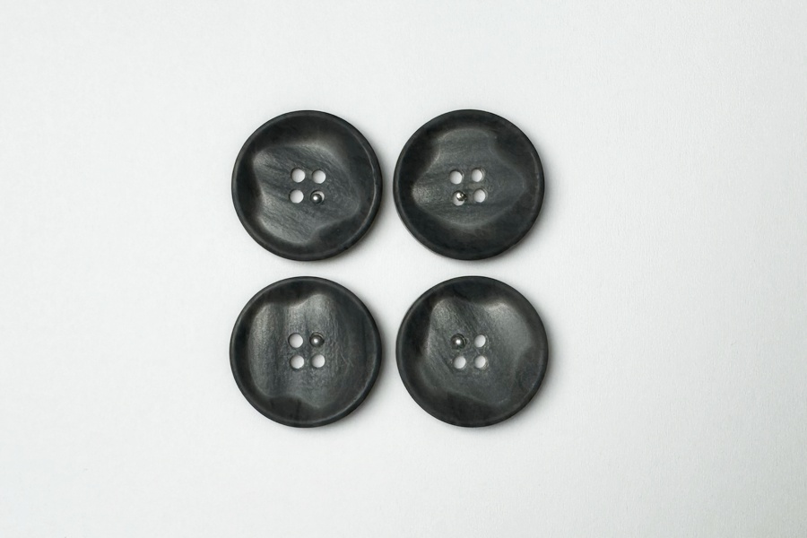 Гудзик 28 мм Mertbutton 4 отвори фактурний сірий темний